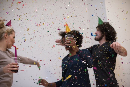 confetti party multiethnic group of people photo