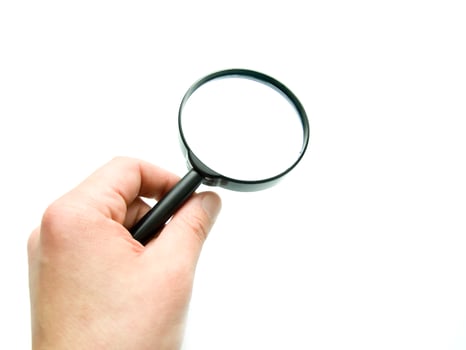 hand with magnifying glass photo