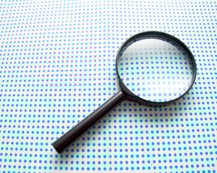 magnifying glass on white photo