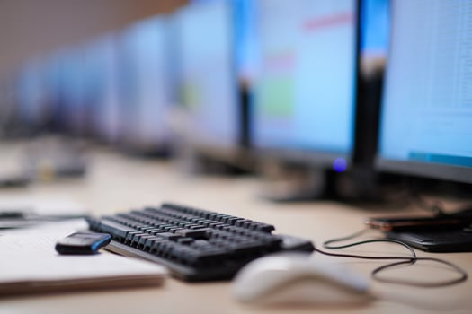 Empty interior of big modern security system control room photo
