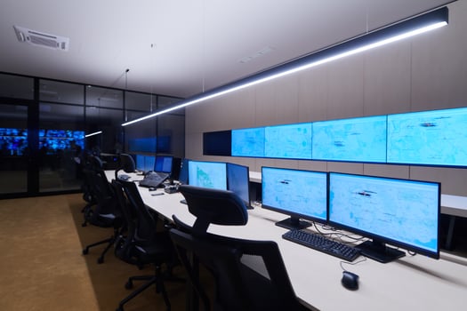 Empty interior of big modern security system control room photo