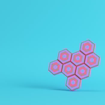 Abstract hexagons with paddles on bright blue background in pastel colors photo