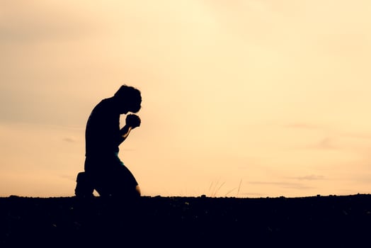 The silhouettes of men are sitting in despair. The concept was discouraged and hopeless. photo
