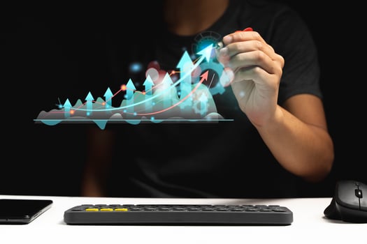 Hand of Businessman or trader showing a growing virtual hologram stock photo