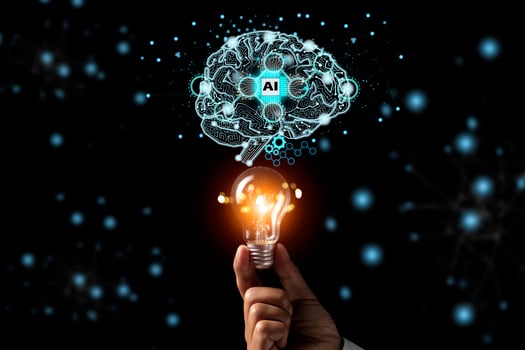 Man holding bulb lamp nad Brain with printed circuit board artificial intelligence AI photo
