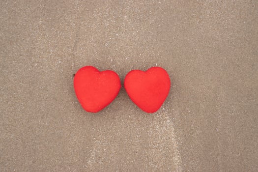 Top View Red heart on a sandy beach concept Valentine day photo