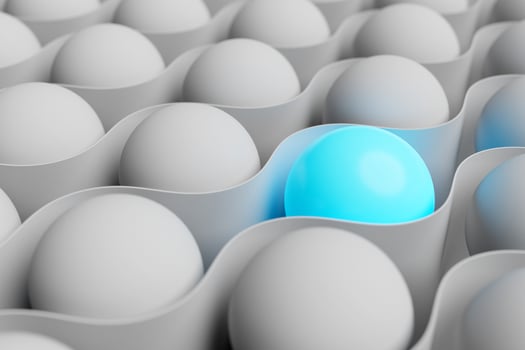 3d illustration geometric volumetric figure of a  white and blue  glowing balls with a white ribbon around them. one item different from others photo