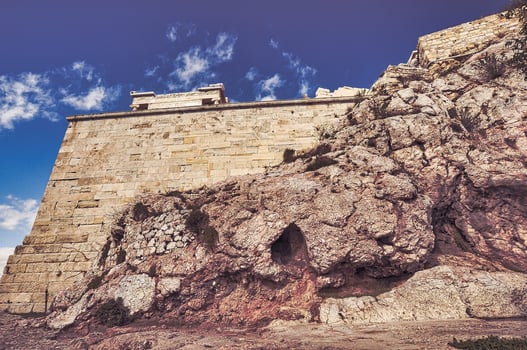 Acropolis of Athens with Parthenon temple over bright blue sky background photo