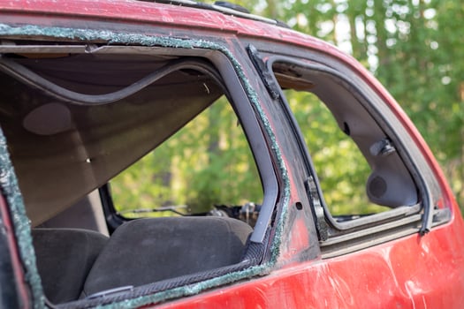 Traffic accident on the street, damaged car after a collision in the city. Accident due to speeding and alcohol intoxication. Transport background. The concept of road safety and insurance. photo