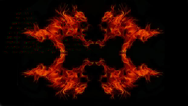A beautiful flame shaped as imagined. like from hell, showing a dangerous and fiery fervor, black background photo