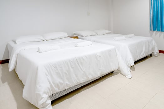 White bedroom with double bed photo