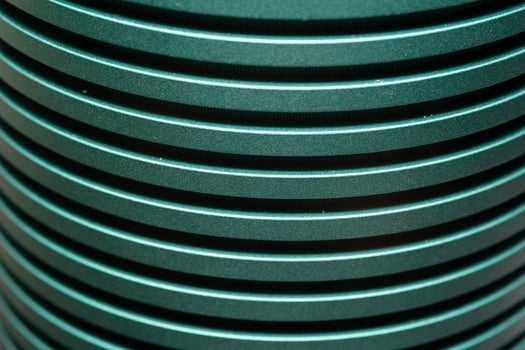 Emerald metallic effect. Turquoise texture shine foil. Background with glitterer metal effect. Blue green surface. Abstract backdrop glitter metal plate. photo