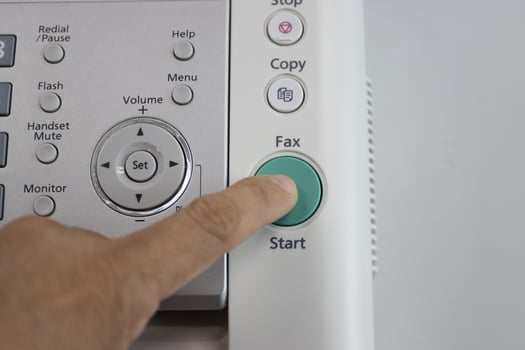 The fax machine for Sending documents in the office photo