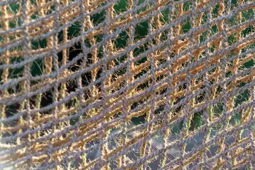 Natural background made of decorative jute mesh photo