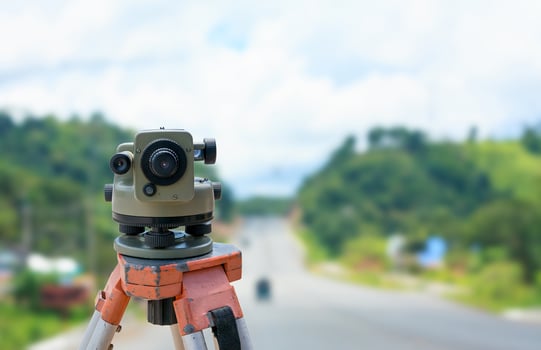 road construction site, theodolite instrument for road construction photo