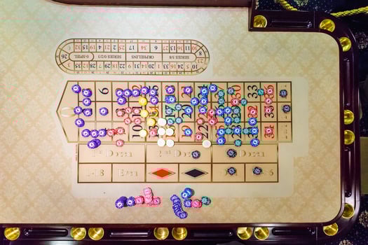 gambling chips on a game table roulette photo