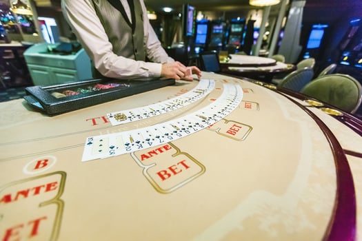 gambling chips and cards on a game table roulette photo
