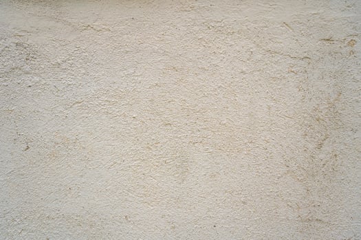 Texture of old gray concrete wall for background. Rough texture on gray wall rough form due to peeling paint layer due to rain photo