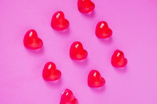 Valentines day background with heart shape candy photo
