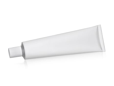Aluminum cream white tube isolated on white background photo