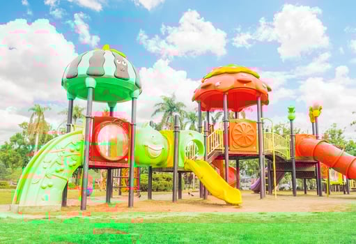 Colorful playground with blue sky background photo