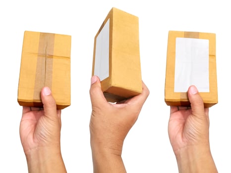 Box in hand on white background isolation photo
