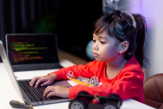 Asia students learn at home in coding robot cars and electronic board cables in STEM, STEAM, mathematics engineering science technology computer code in robotics for kids concept. photo