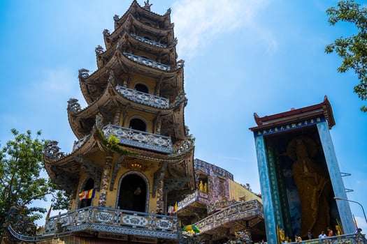 Linh Phuoc Pagoda in Da Lat, Vietnam. Dalat's famous landmark, buddhist porcelain glass temple. Linh Phuoc Pagoda in Dalat Vietnam also called Dragon Pagoda. photo
