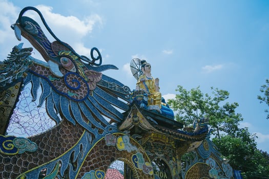Linh Phuoc Pagoda in Da Lat, Vietnam. Dalat's famous landmark, buddhist porcelain glass temple. Linh Phuoc Pagoda in Dalat Vietnam also called Dragon Pagoda. photo