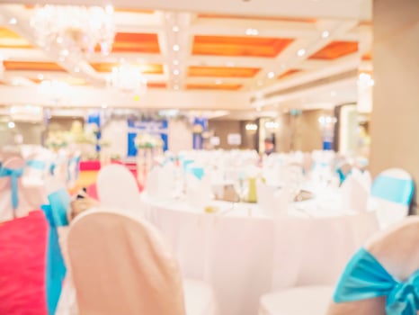 Blurred photo of empty table of wedding reception in a hotel
