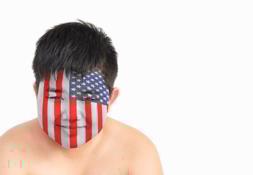 Smile cute fat boy with American flag overlay on his face, USA fan concept. photo