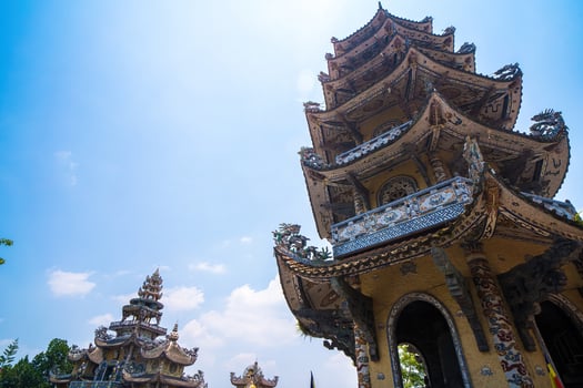 Linh Phuoc Pagoda in Da Lat, Vietnam. Dalat's famous landmark, buddhist porcelain glass temple. Linh Phuoc Pagoda in Dalat Vietnam also called Dragon Pagoda. photo