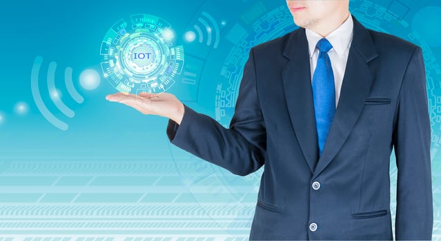 Businessman is open his palm upwards to present internet of things icons IOT concept photo