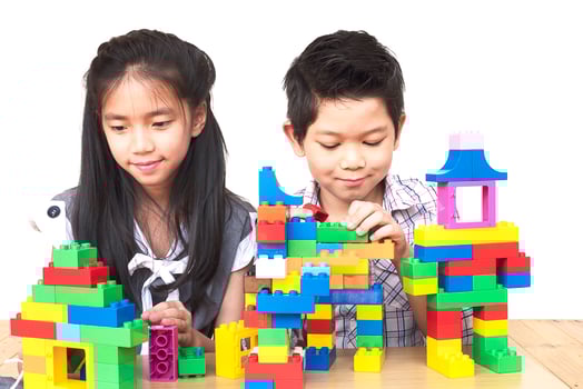 Kids playing pieces plastic creative construction blocks photo