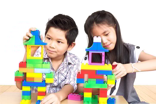 Kids playing pieces plastic creative construction blocks photo
