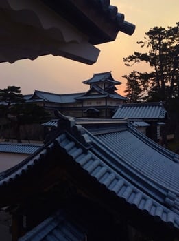 Kanazawa castle in Japan during sunset photo