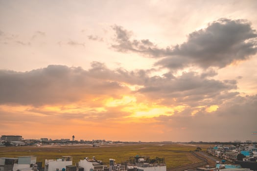 Ho Chi Minh city, Vietnam - FEB 12 2022 Airplane fly over urban areas preparing landing into Tan Son Nhat International Airport and takes off in TSN airport photo