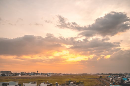 Ho Chi Minh city, Vietnam - FEB 12 2022 Airplane fly over urban areas preparing landing into Tan Son Nhat International Airport and takes off in TSN airport photo