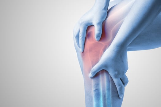 Human Knee Injury Knee Pain Joint Pain Medical Person Highlighting Black And White Tone On The Knee photo