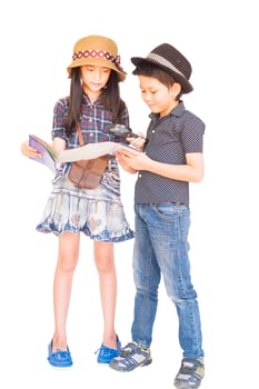 Asian boy and girl travelers are studying map prepare to go, isolated over white background photo