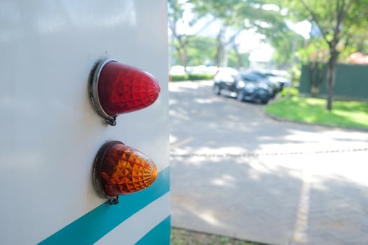 Close up shot of a vintage car rear turn signal. photo