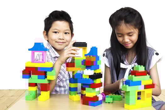 Kids playing pieces plastic creative construction blocks photo