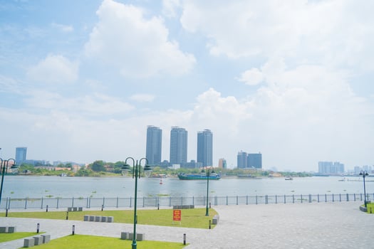Ho Chi Minh city, Vietnam - FEB 13 2022 skyline with landmark 81 skyscraper, a new cable-stayed bridge is building connecting Thu Thiem peninsula and District 1 across the Saigon River. photo