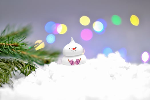 cute edible snowman on the snow photo