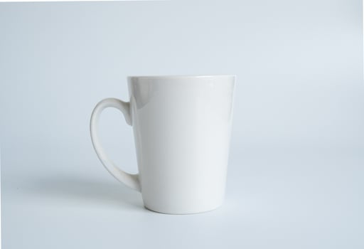 White coffee cup top view photograph On a white saucer The inside of the glass looks empty. Waiting for hot coffee to be refilled to drink to feel refreshed and alert on a white background. photo