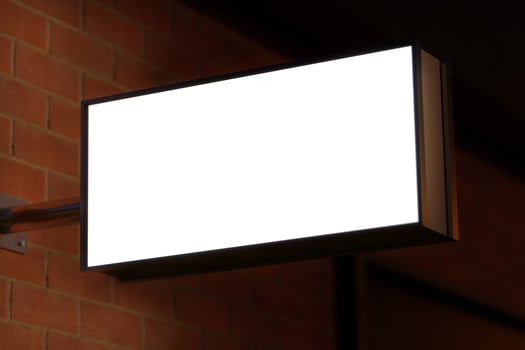 wall signage logo mockup with night light photo