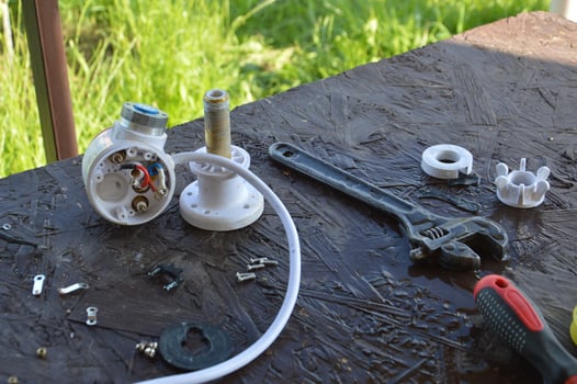 Repair of the flowing tap of the water heater in the kitchen photo