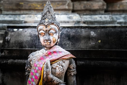 kind of vintage buddhism statue. photo