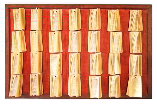 BANGKOK THAILAND  FEBRUARY, 2014  Fortune telling notes on board. Strip paper answers from Chi-Chi sticks or fortune sticks. photo