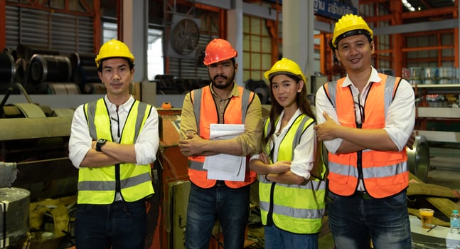 Engineering team leader Is advising the technician team and the quality inspection team. photo